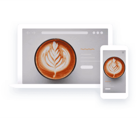 notebook and smartphone displaying website with cafe