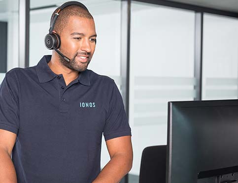Support agent with headset talking to customer